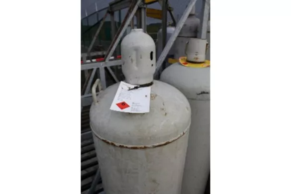 defecte gasfles met label